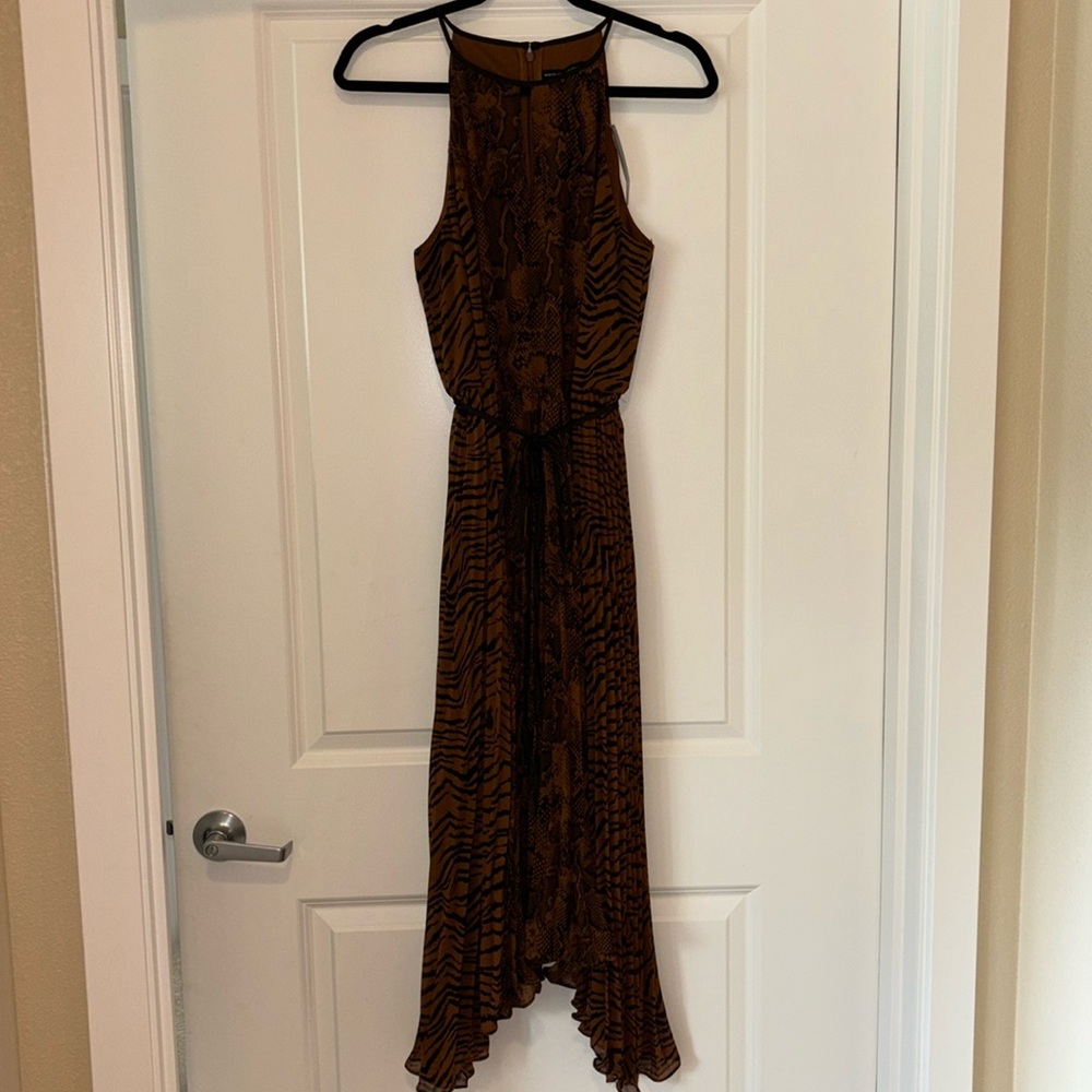 White House black market never been worn sleeveless pleated dress.